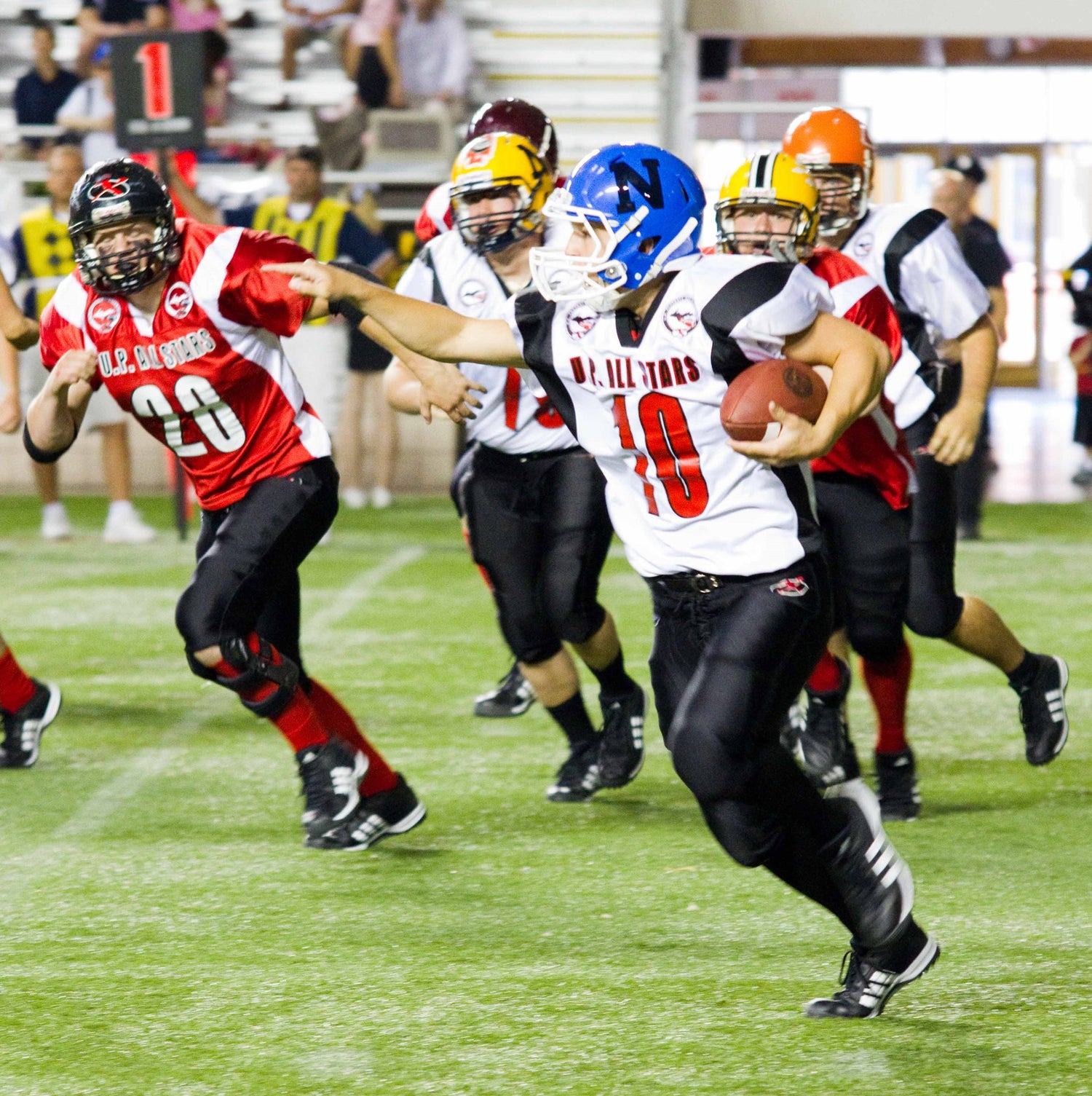 football player running with the ball 40 yard dash