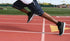 track runner exploding out of starting blocks